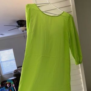 Lime green boutique dress. That is not a stain in it - just the tag showing.